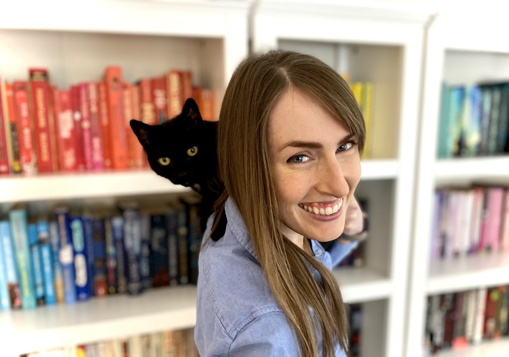 Picture of a woman and a black cat